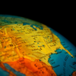 A close up of a globe with a map of the united states.